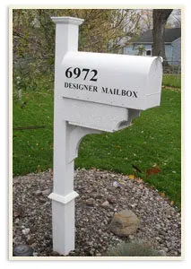 White Designer Mailbox with a Tree in Background